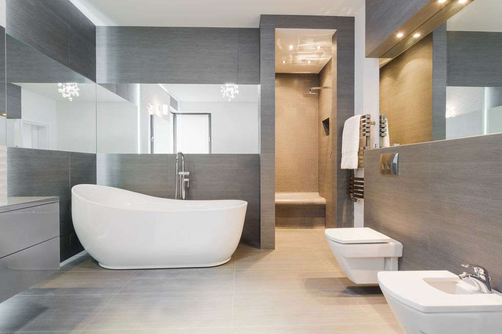 Renovated bathroom with updated fixtures and tile